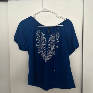 Blue blouse with floral design